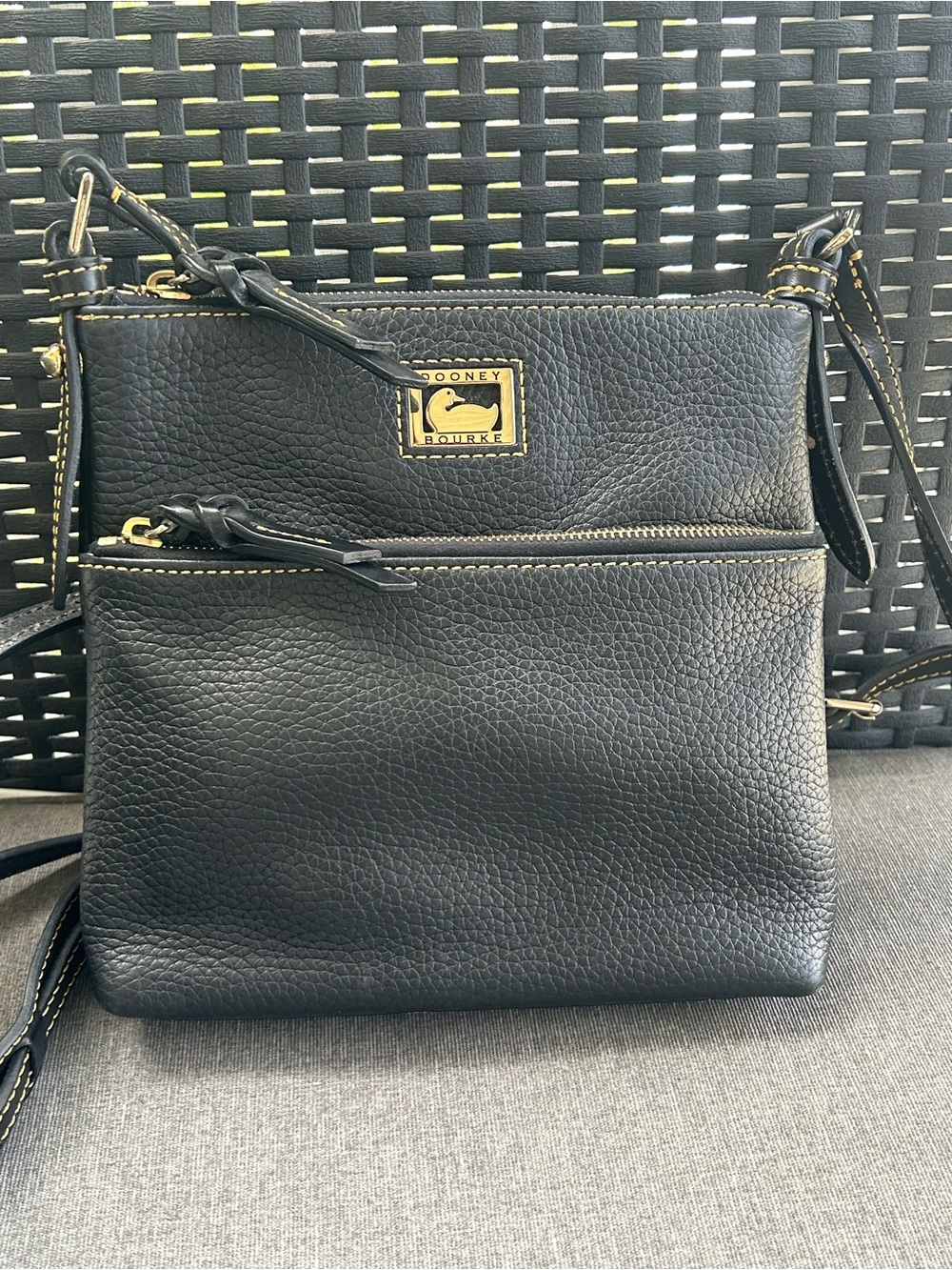 Dooney & Bourke Black Pebble Grain Letter Carrier bag